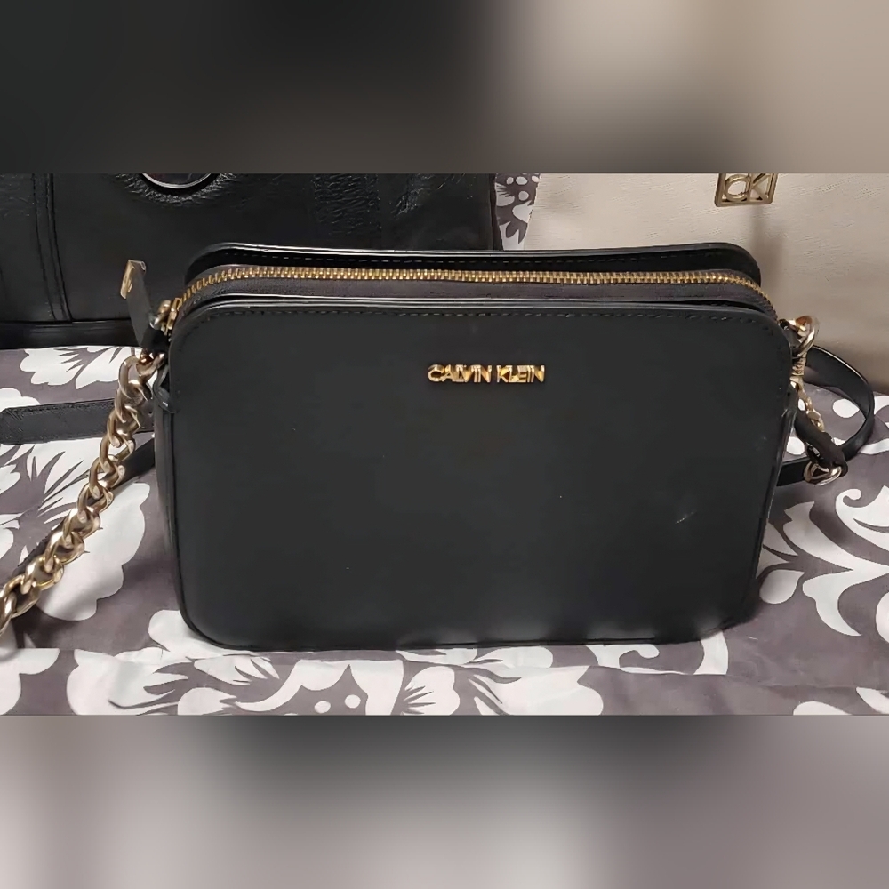 Calvin Klein Black Crossbody Bag with Gold Accents